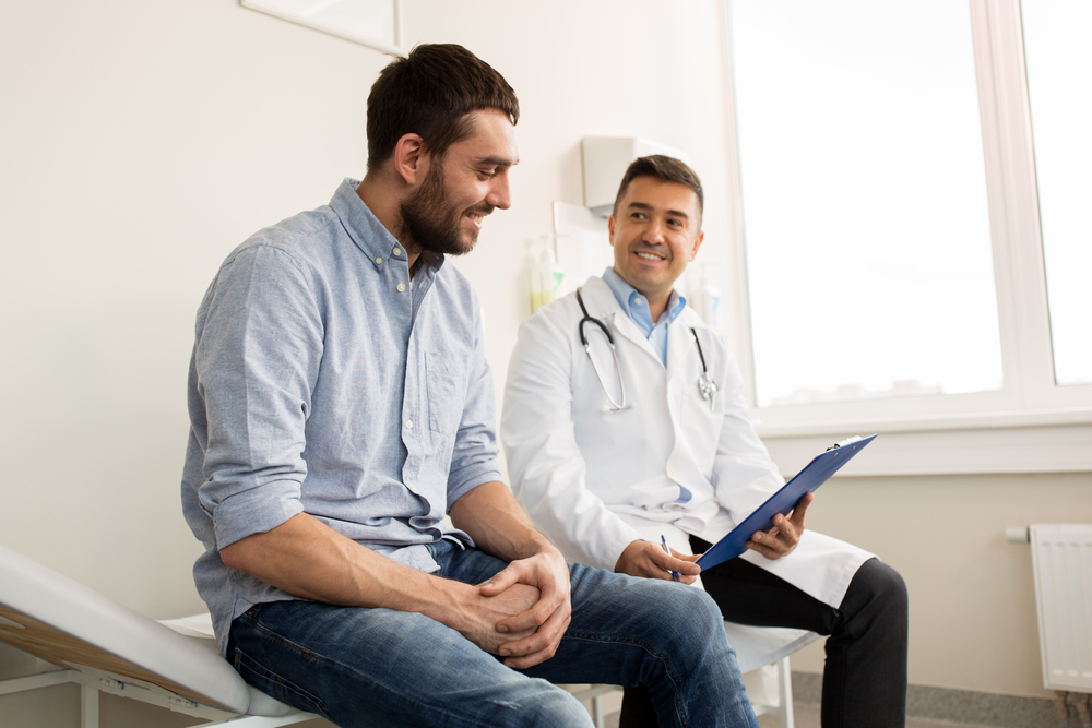 Doctor speaking with patient