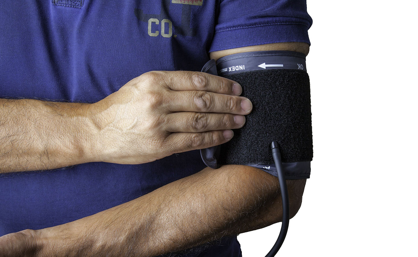 man getting his blood pressure taken