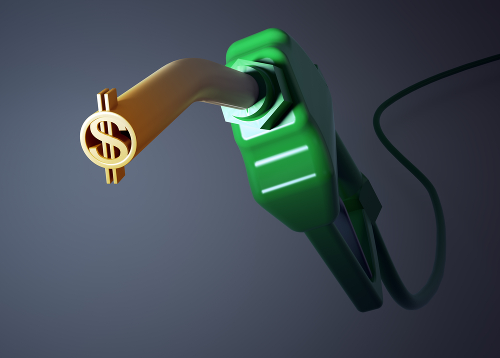 Gasoline nozzle with a money sign on the end.