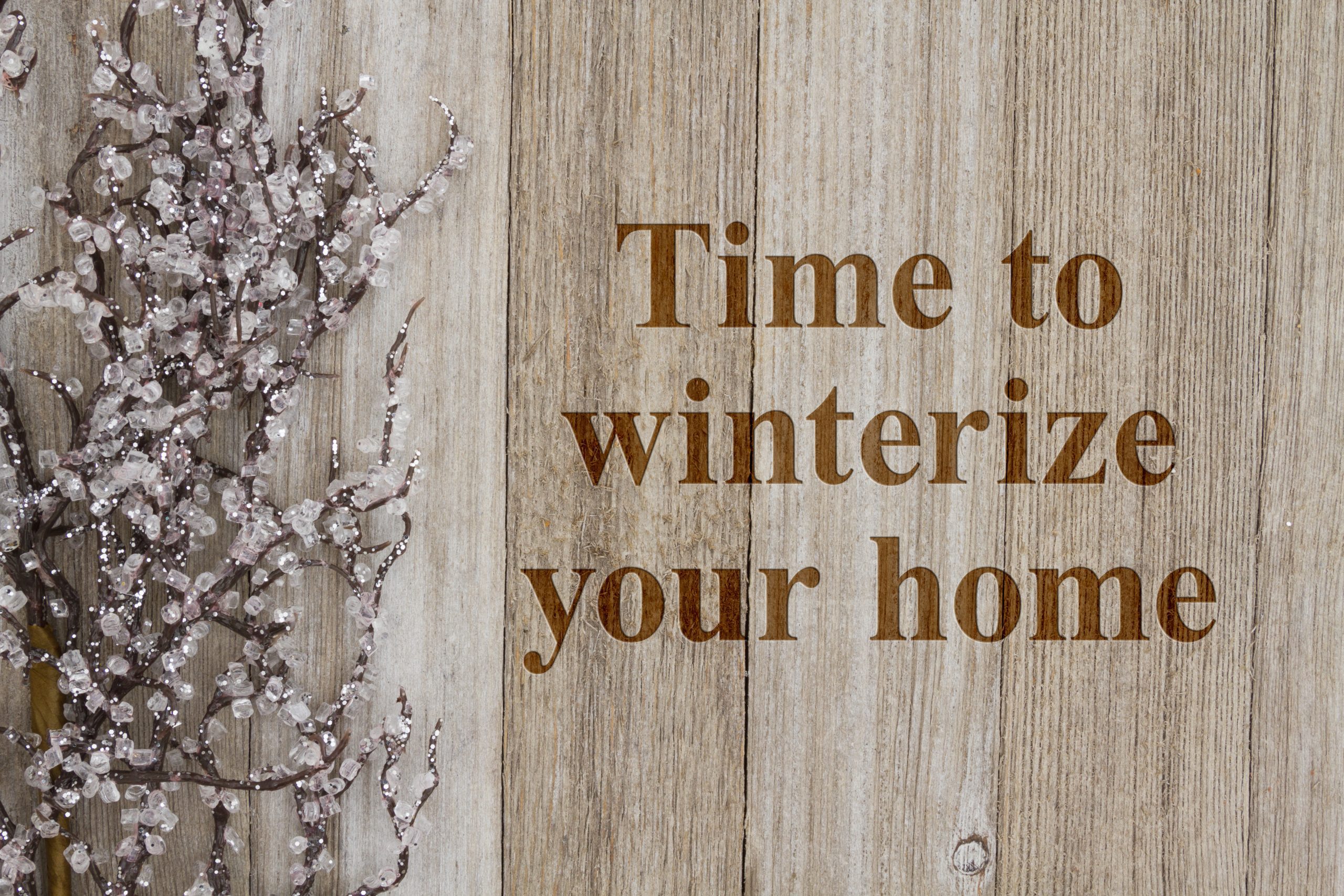 Winter background with "Time to Winterize Your Home" written out
